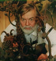 Kox in his work; Detail of  "Revelation Twelve...";  welded and forged steel sculpture. Click here for statement of purpose 
